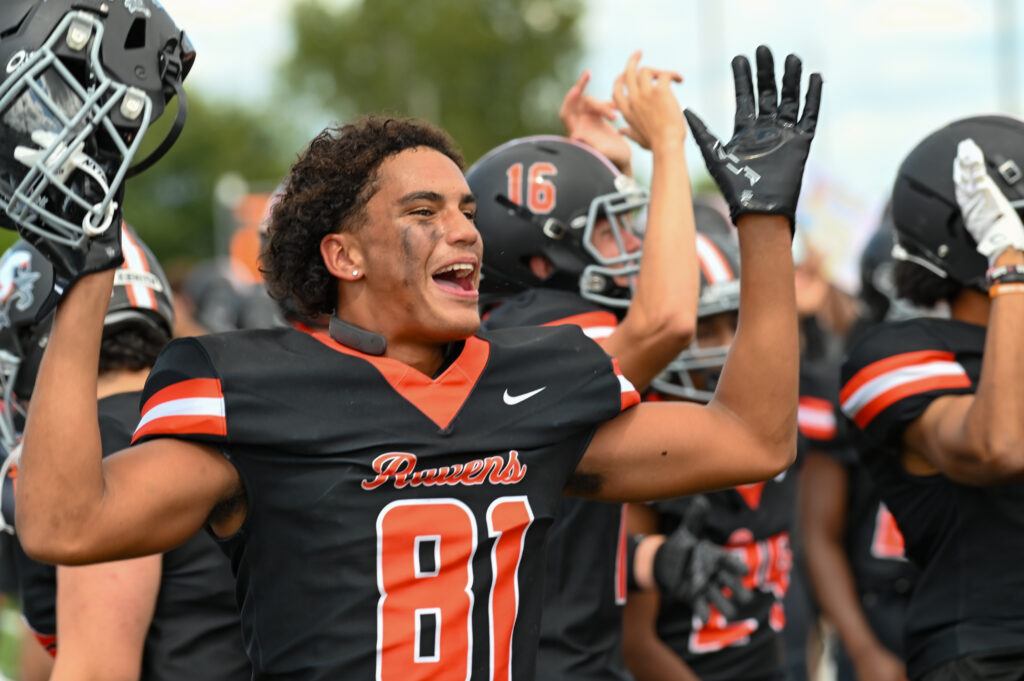 AU Footballer 81 celebrates victory