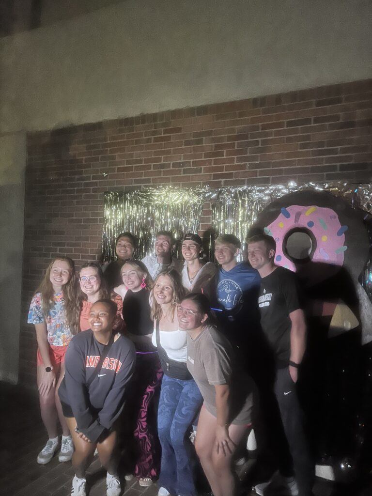 Students posing at the photo booth