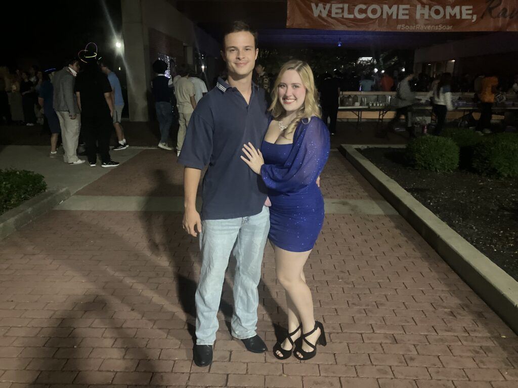 A couple smiling and posing