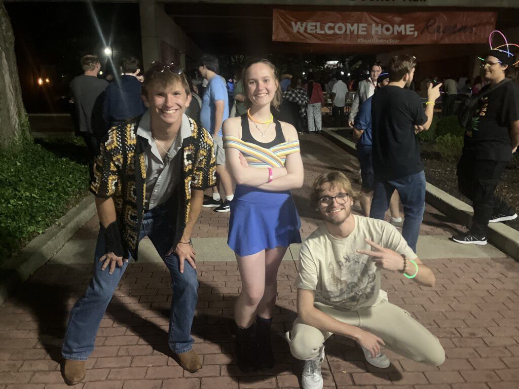 Three students hitting a cool pose