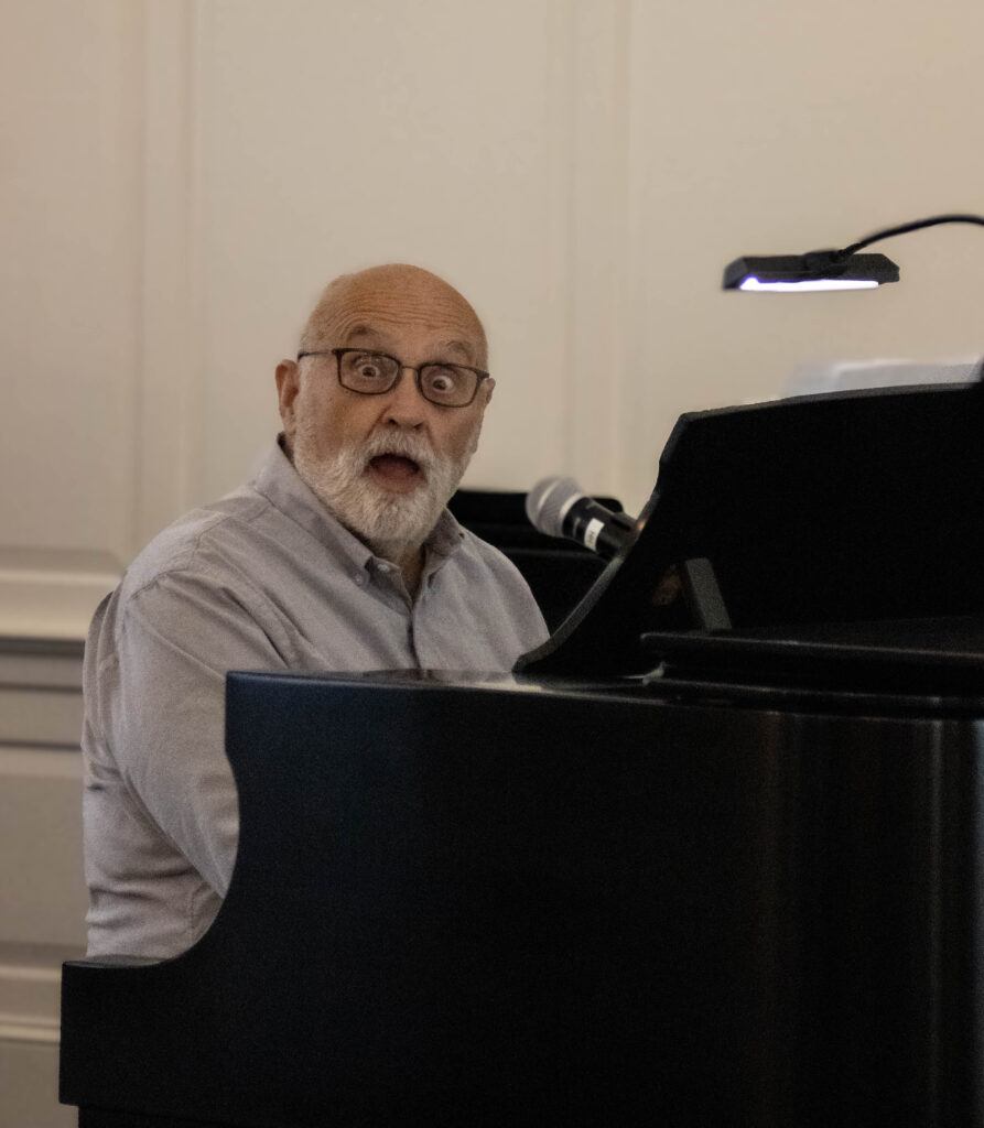 Mick Gilliam on the piano with an amusingly shocked expression