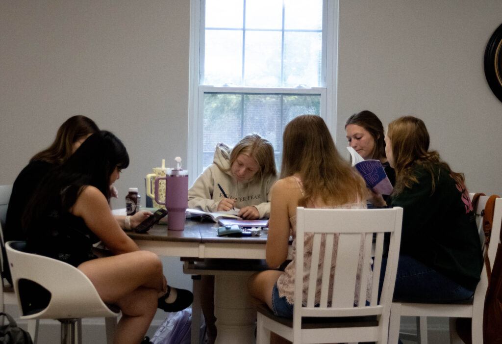 Women from the Delight Women's Bible Study sitting around a table