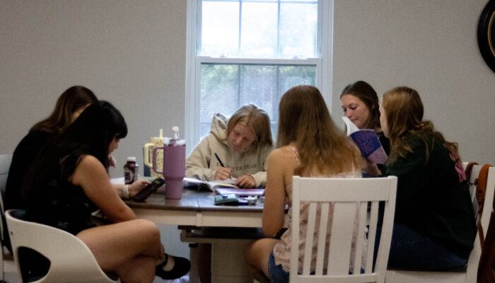 Women from the Delight Women's Bible Study sitting around a table