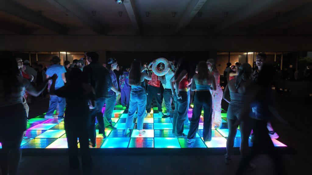 Students on the colorful dance floor