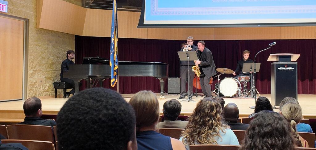 The AU Jazz Ensemble performing on stage